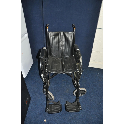 A WHEELTECH FOLDING WHEELCHAIR Barnebys