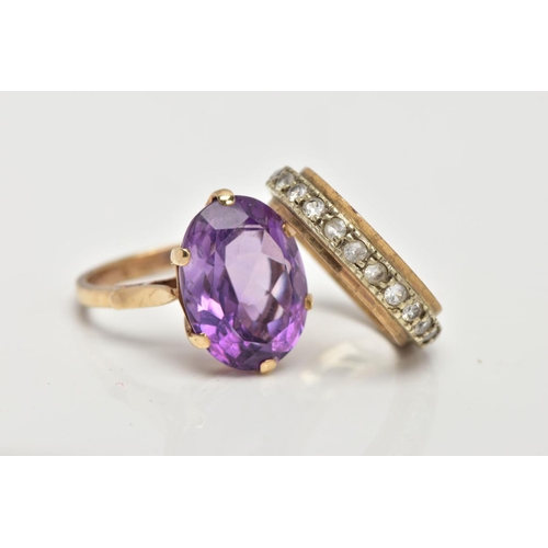 14 - AN AMETHYST DRESS RING AND SPINEL FULL ETERNITY BAND RING, the first designed with an oval cut ameth... 