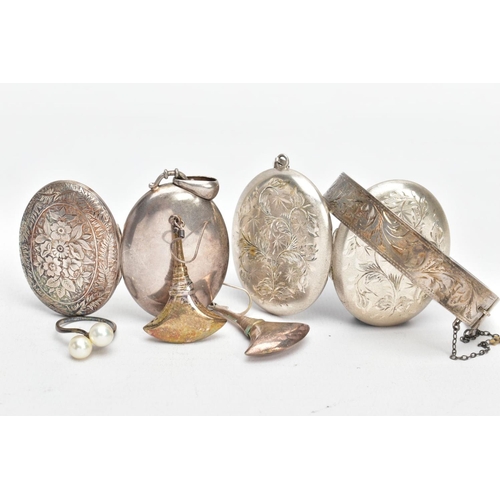 17 - A SELECTION OF SILVER JEWELLERY, to include a silver engraved locket with foliage detailing, photo o... 