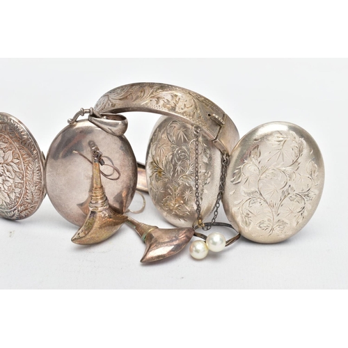 17 - A SELECTION OF SILVER JEWELLERY, to include a silver engraved locket with foliage detailing, photo o... 