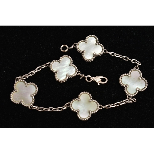 25 - A VAN CLEEF & ARPELS VINTAGE ALHAMBRA BRACELET WITH BOX, with five mother of pearl motifs interspace... 