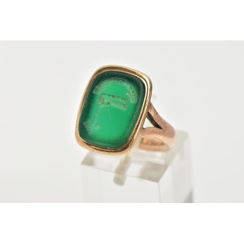 55 - A 9CT GOLD INTAGLIO RING, of a rectangular form set with a green hardstone carved intaglio, with the... 