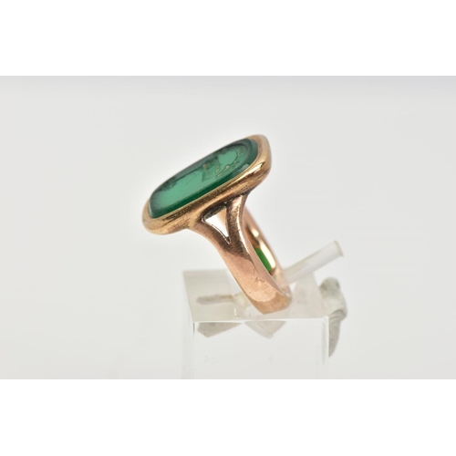 55 - A 9CT GOLD INTAGLIO RING, of a rectangular form set with a green hardstone carved intaglio, with the... 