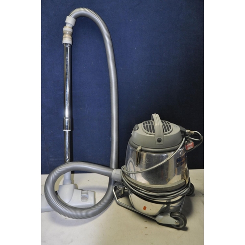 A NILFISK GM80P retro vacuum cleaner (PAT fail due to taped Barnebys