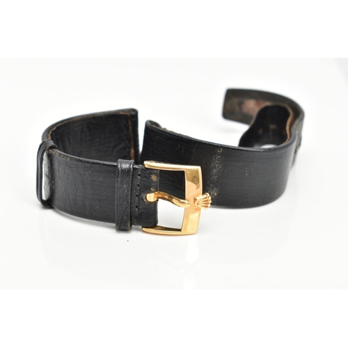 14 - AN ORIGINAL BLACK 'ROLEX' WATCH STRAP, fitted with a yellow metal 'Rolex' motif ardillon buckle, sta... 