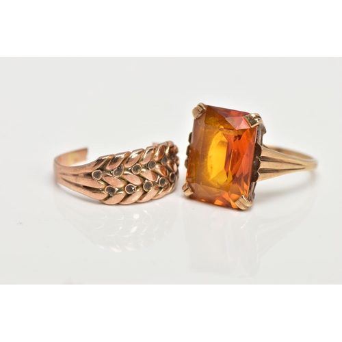 48 - TWO YELLOW METAL RINGS, the first designed with a four claw set, rectangular cut citrine, textured t... 