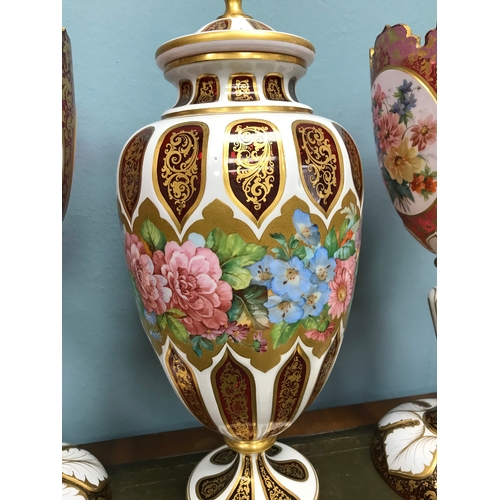93 - A Pair of Cranberry glass Bohemian Moser White enamel overlay vases and matching urn with lid. Both ... 