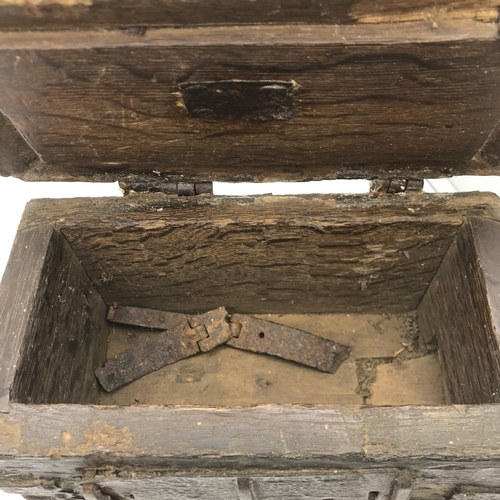 276 - A 15TH/ 16TH Century small treasure/ document trunk. Made from wood and cast iron hinges. Measures 2... 