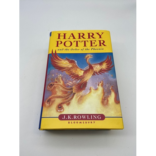 A 1st edition Harry Potter and the order of the phoenix hard back book. Printed 2003. ISBN 0 7475 51