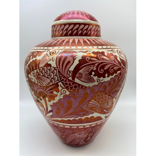 100 - William De Morgan [1839-1917]
19th century Ruby lustre fish design vase with lid. Impressed marking ... 