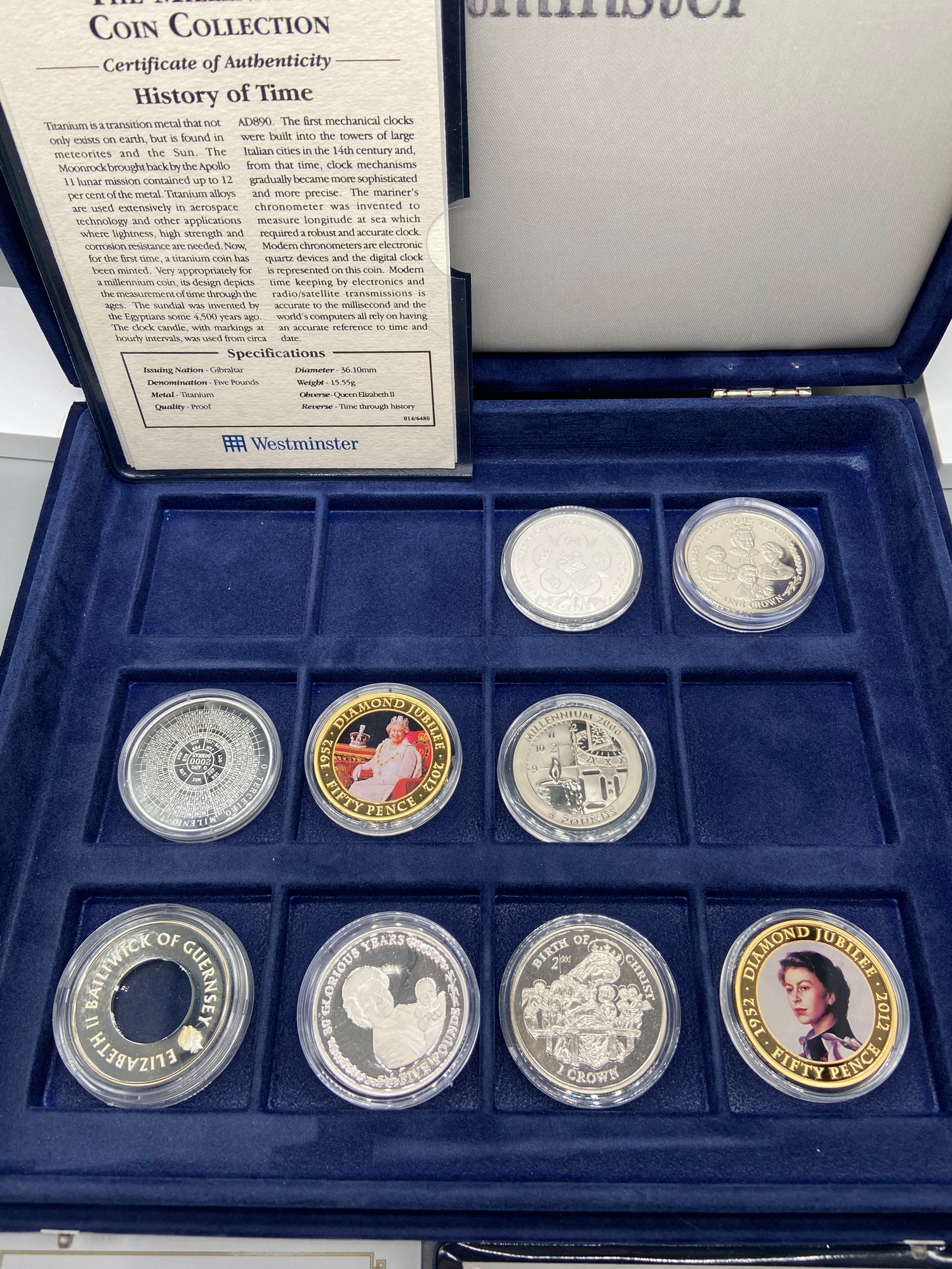 A Westminster Mint 'The Millennium' coin collection [4 coins] with a