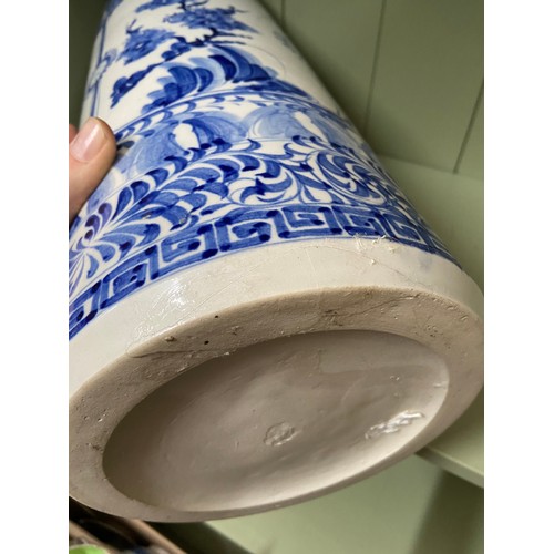 186 - A 20th century Chinese blue and white paint brush pot/ stick stand. [A/F]