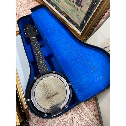 440 - An English made 8 string banjo with carry case