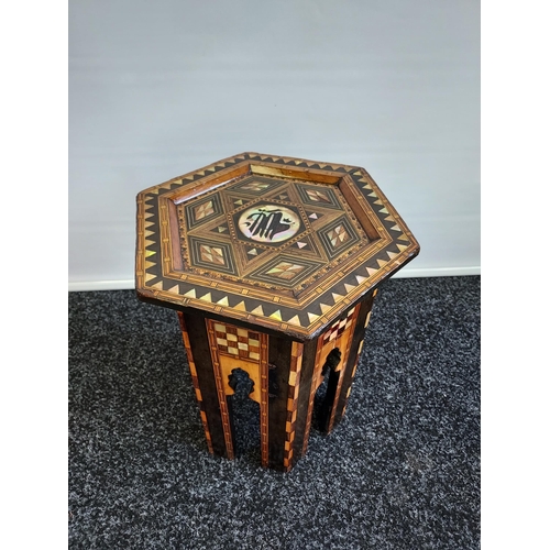 240 - A Liberty & Co design Arabic Hexagonal side table, designed with mother of pearl inlays. [44cm in he... 