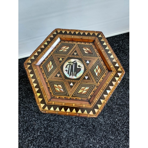 240 - A Liberty & Co design Arabic Hexagonal side table, designed with mother of pearl inlays. [44cm in he... 