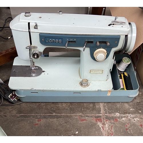 A Vintage Jones sewing machine with carry case Barnebys