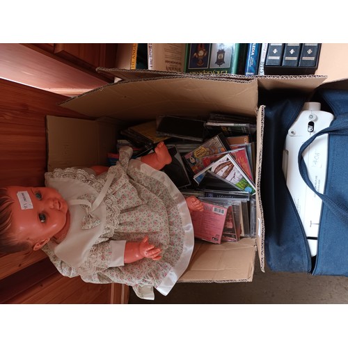 40a - 2 Boxes of odds to include books, cd's, vintage doll and sewing machine
