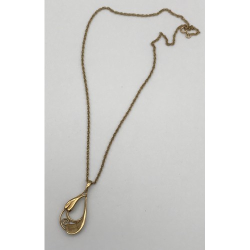 14 - A Ladies 9ct gold floral design pendant with a 9ct gold necklace. [7.97grams]