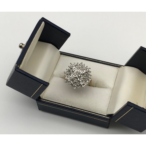 7 - A Beautiful ladies 9ct yellow gold and diamond cluster ring. [5.89grams] [Ring size ]