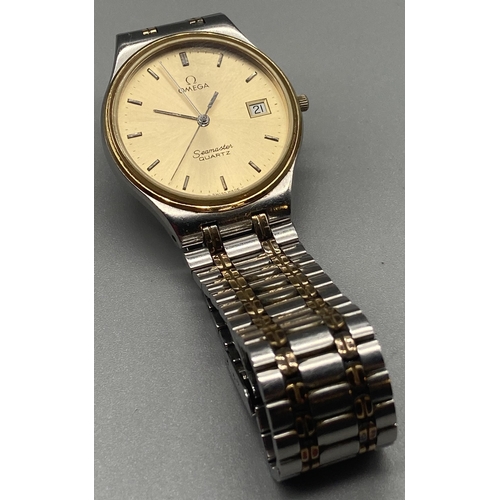 20 - A Gent's Vintage Omega Seamaster Quartz watch, two tone strap, in a working condition, Serviced 27.0... 