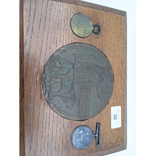30 - A WW1 Death plaque and medals belonging to Robert Edward Metheringham.