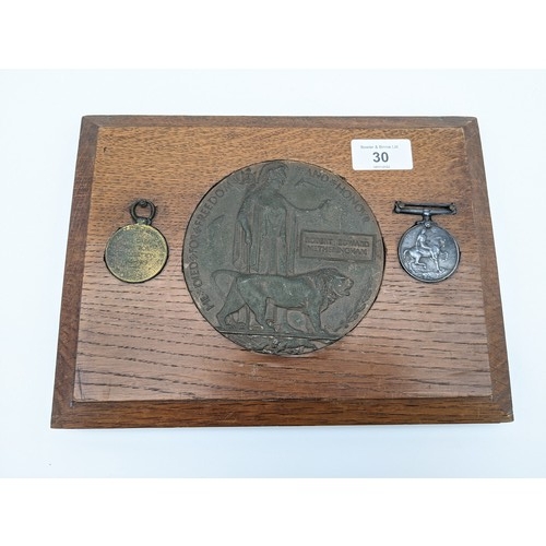 30 - A WW1 Death plaque and medals belonging to Robert Edward Metheringham.