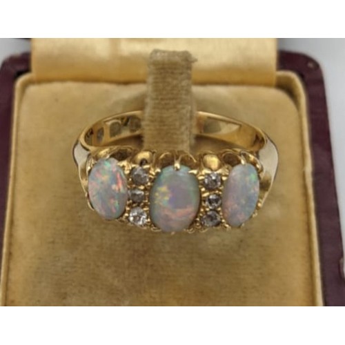 46 - An Antique 18ct gold diamond and opal stone ladies ring. [Ring size Q] [5.79grams]