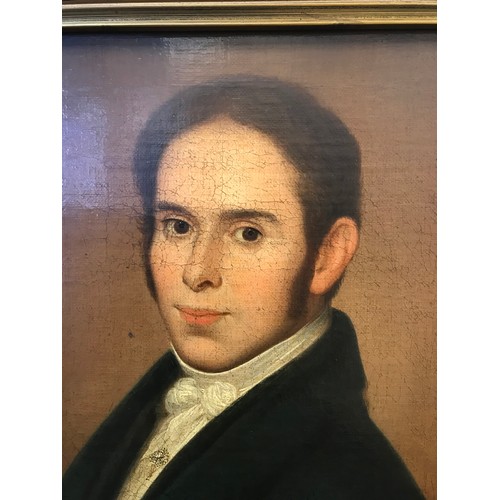 382 - An Antique oil painting on canvas depicting a gentleman's portrait. Fitted within a gilt frame. [Fra... 