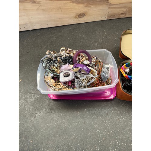 242 - Two tubs of various costume jewellery