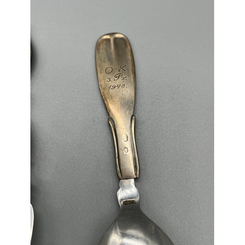 27 - A Lot of three Danish silver handle serving utensils. Two ornate handle utensils produced by Carl M ... 