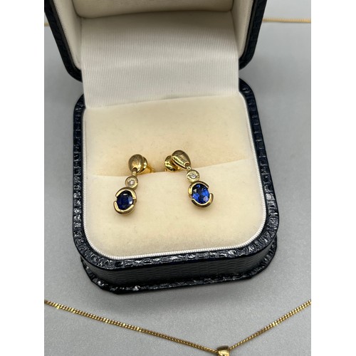 13 - 9ct yellow gold Sapphire and diamond pendant with matching earrings. Together with a 9ct yellow gold... 