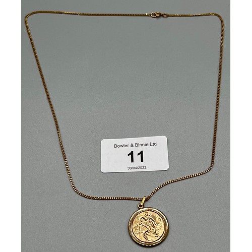 11 - 9ct yellow gold necklace with a 9ct yellow gold St. Christopher's pendant. [4.11grams] [44cm length]