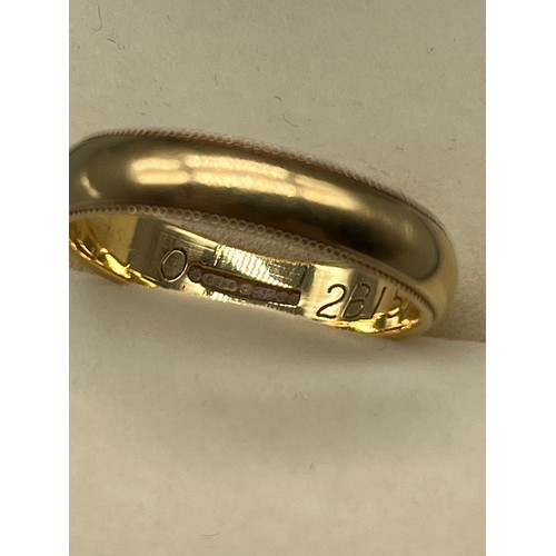 9 - An 18ct yellow gold wedding band. [Ring size O] [4.24Grams]