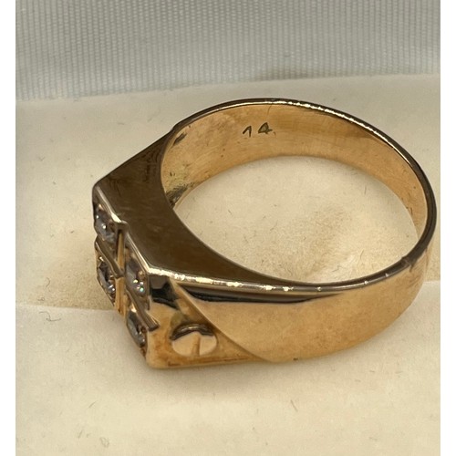 1 - A Gold gents four diamond stone ring. Stamped 14. [6.25grams] [Ring size- R]