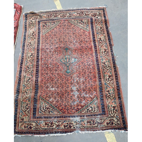20 - Two small antique rugs. One in an Aztec style.
