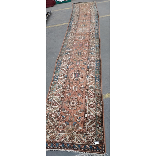 21 - A Large antique hall runner rug[475x77cm]