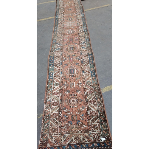 21 - A Large antique hall runner rug[475x77cm]