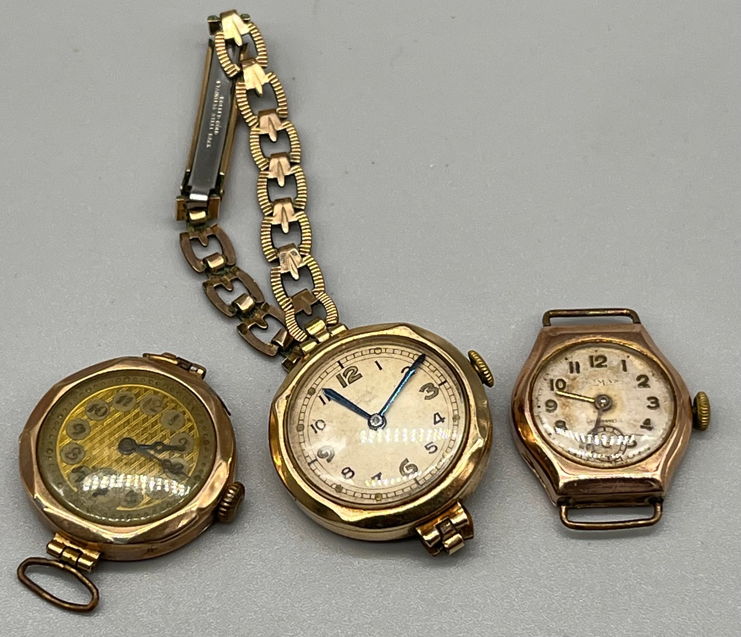 Three antique ladies 9ct gold cased watches, Includes Everite 15 jewels comes with a plated strap.