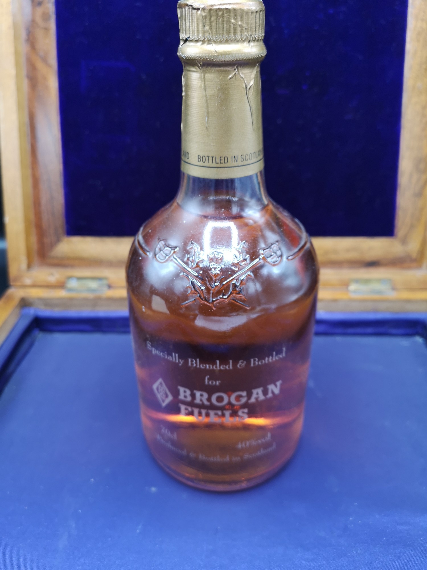 Bottle of brogan fuels bottled in Scotland whisky full and sealed.