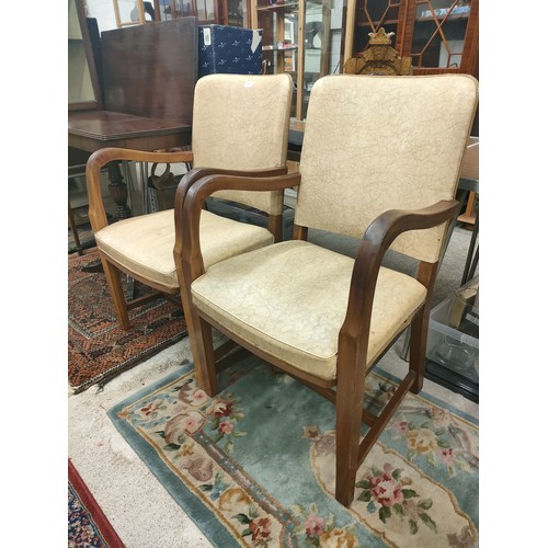 31 - Pair of antique light oak style chairs with leather upholstery.