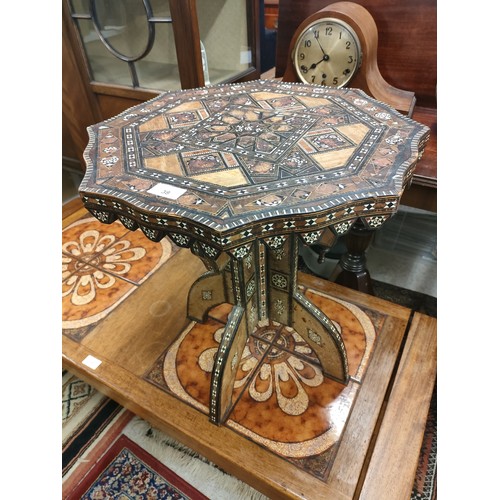 38 - Antique eastern inlaid table with inlays . Does need attention.