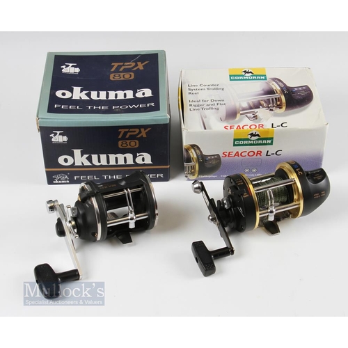 56 - 2x Sea Reels - Cormoran Seacor L-C reel with line counter in original box with light signs of use, w... 