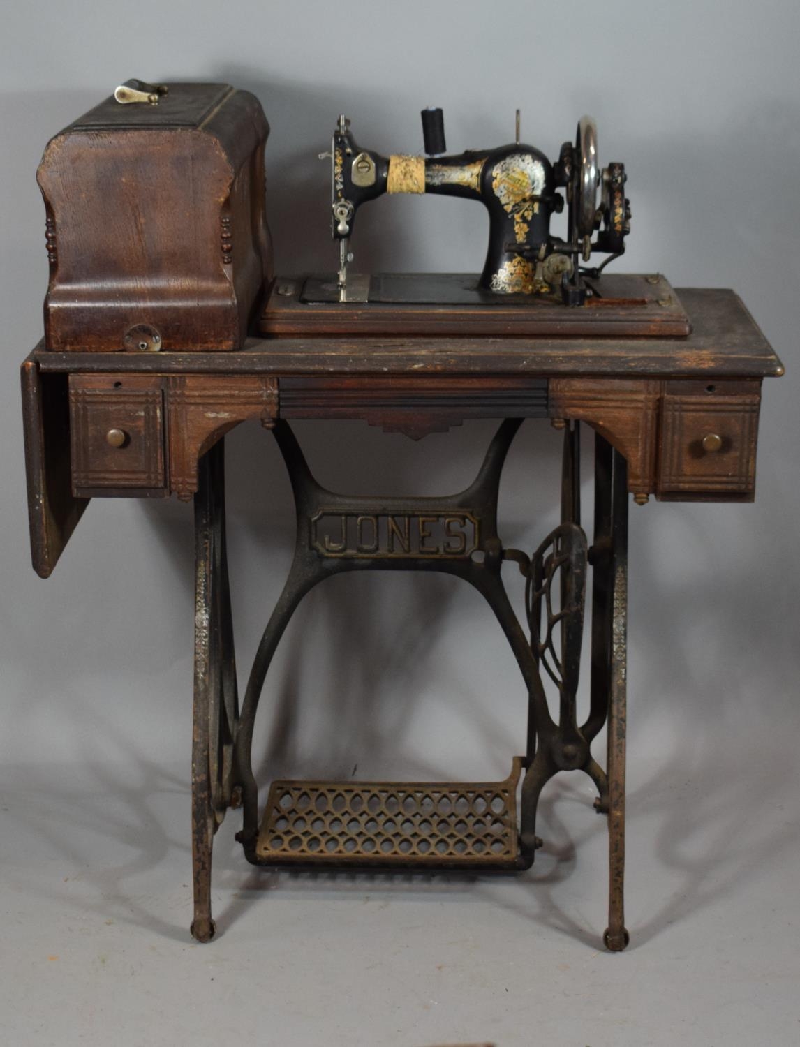 A Vintage Oak Jones Treadle Sewing Machine