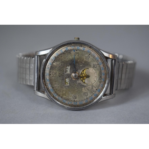 288 - An Omega Stainless Steel 'Cosmic' Triple Date Moonphase Gents Wrist Watch Circa 1950, with French Da... 
