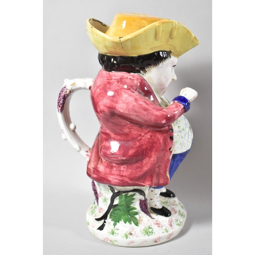61 - A Large Staffordshire Snuff Taking Toby Jug, Usual Coloured Enamels, One Arm AF, 27cm high