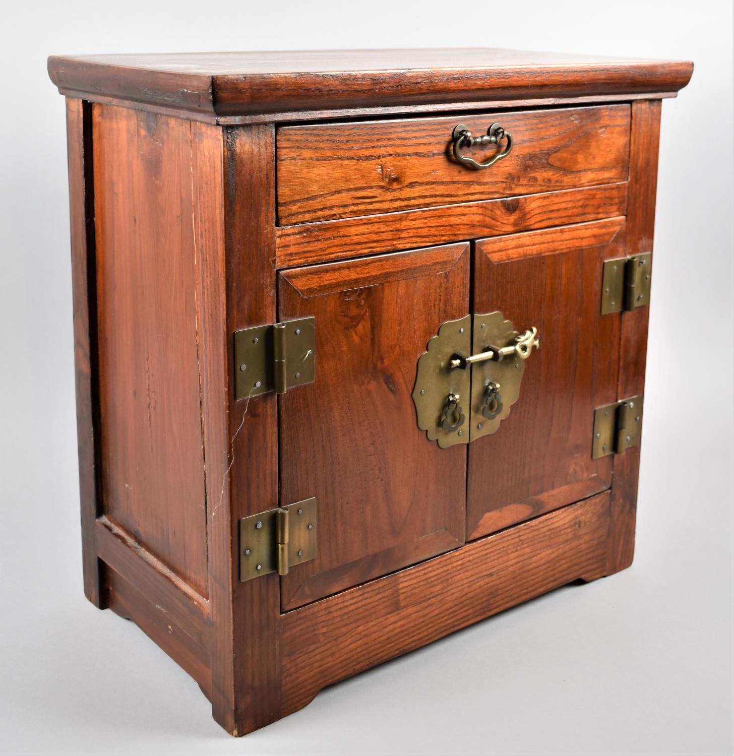 A Chinese Brass Mounted Hardwood Table Top with Single Top Drawer Over Cupboard Base, 40cm W