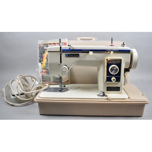 A Vintage New Home Electric Sewing Machine with Foot Pedal Barnebys