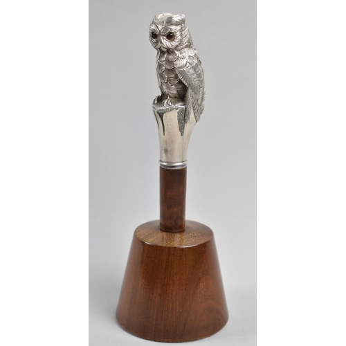 A Very Good Quality American Sterling Silver Walking Cane Handle in the Form of a Long Eared Owl with Red Glass Eyes, Engraved for T A Manny, 2714 Olive Street. Mounted on Turned and Polished Wooden Stand of Tapering Form, 19cm high