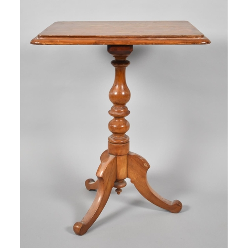18 - A Late Victorian Pitch Pine Tripod Table. 59x49x73cms