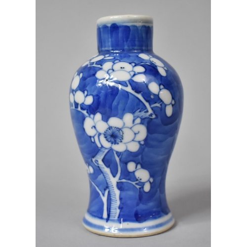 273 - A Small 19th Century Chinese Blue and White Prunus Blossom Vase of Baluster Form, Six Characters in ... 